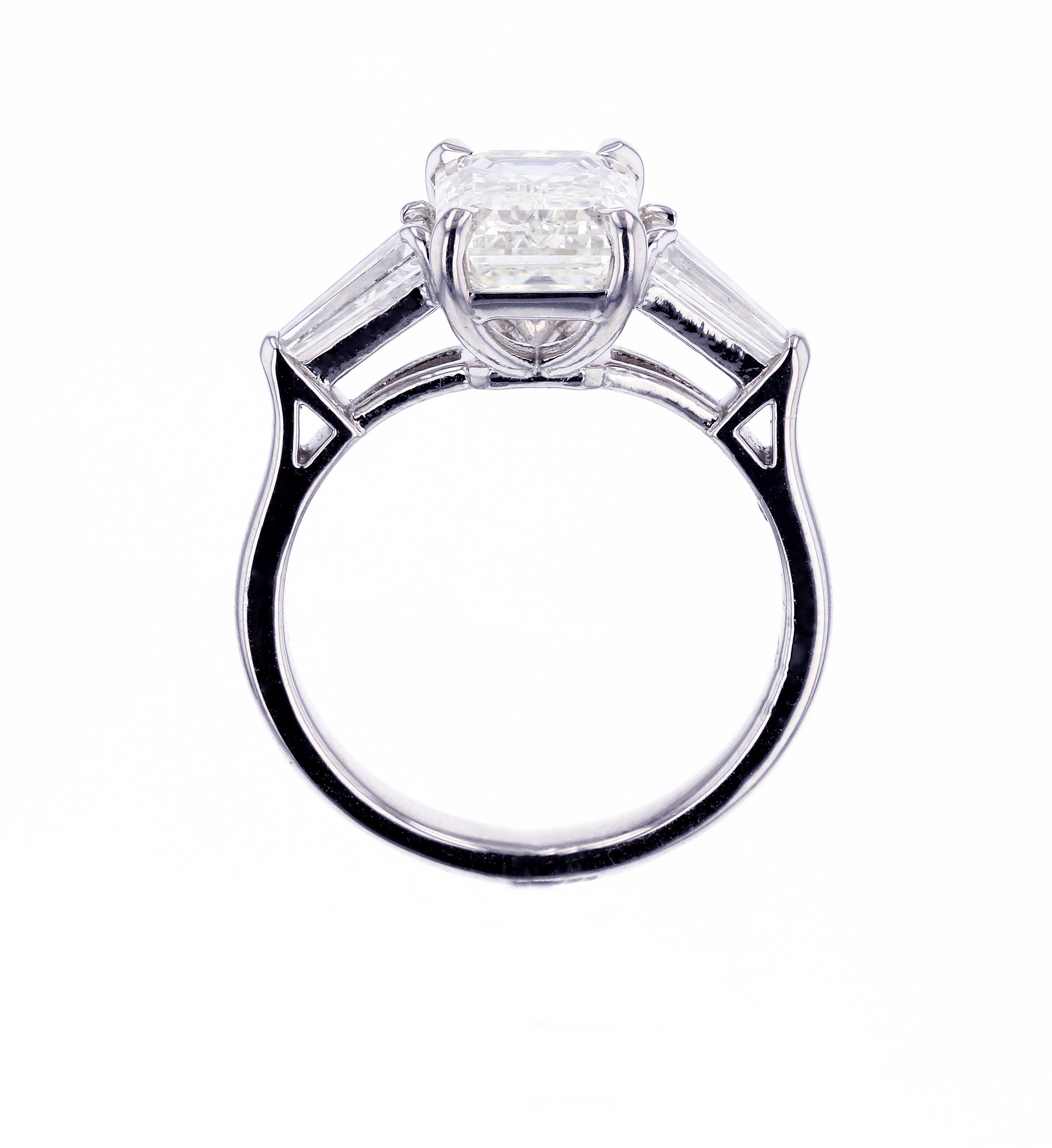 Three-stone Emerald Engagement Ring